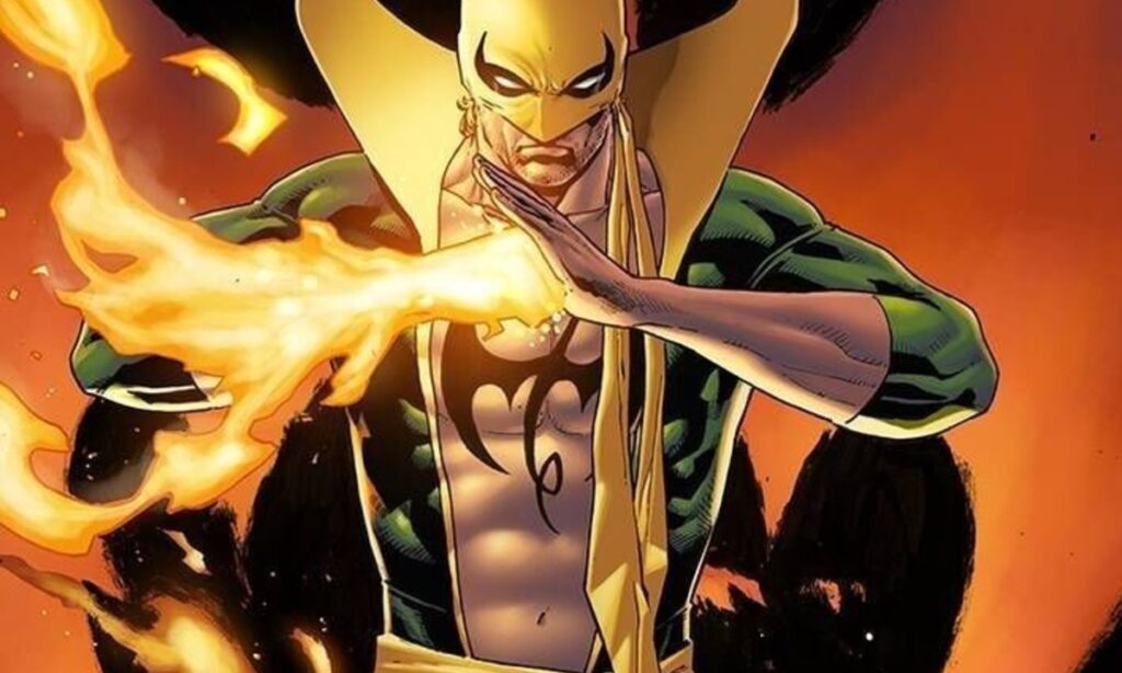 Iron Fist channels flaming chi energy with focused power in his classic comic costume.