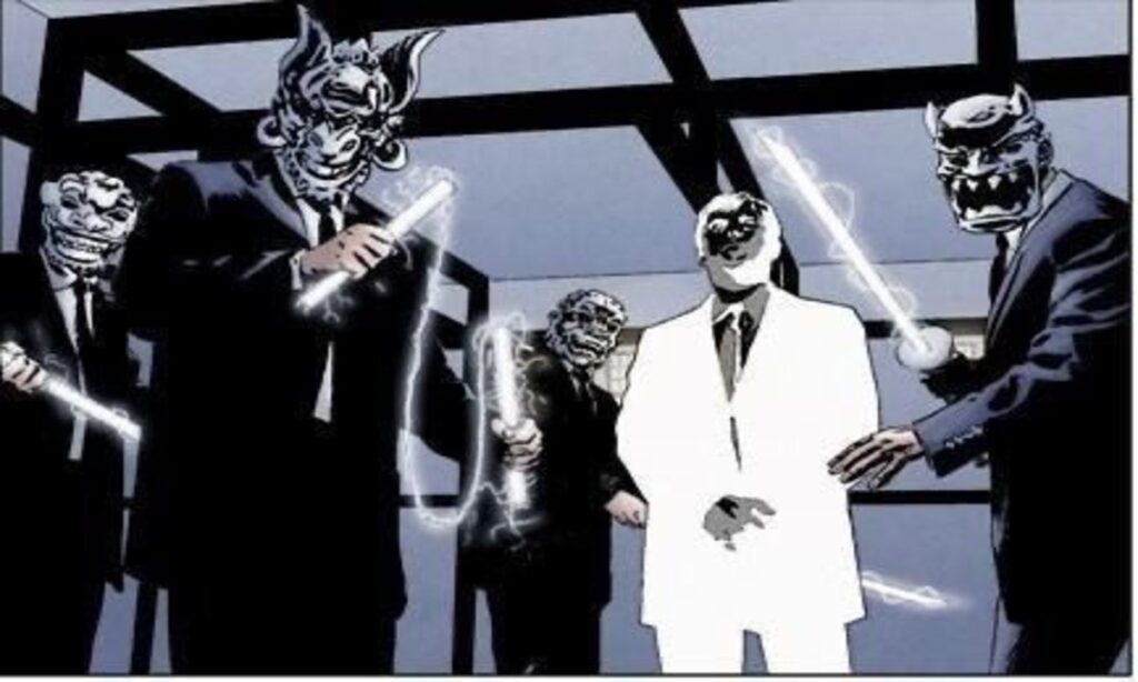 Mister Negative, in white, faces masked figures wielding glowing energy, in a stark setting.