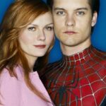 Peter Parker and Mary Jane pose together, highlighting emotional bond and superhero love story.